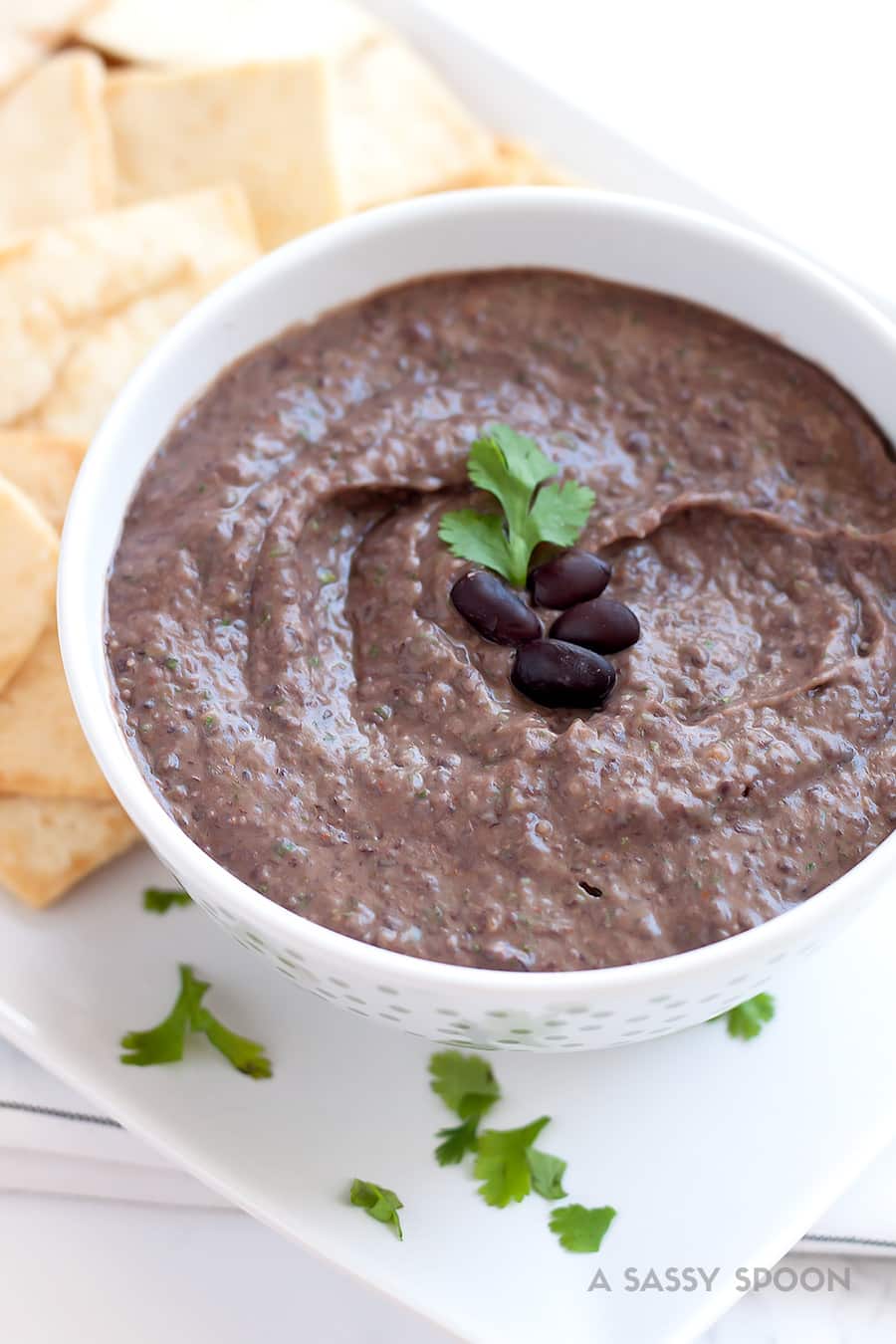 Black bean hummus served with pita chips