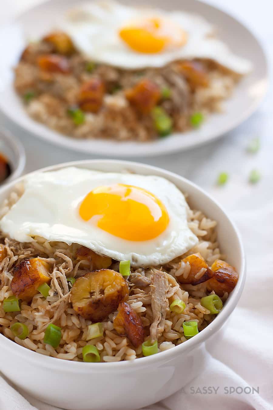 Easy Cuban Pork Fried Brown Rice. Brown rice with Cuban-style pulled pork, chopped sweet plantains, scallions, and a fried egg. An easy 20-minute meal using leftover pulled pork and brown rice!