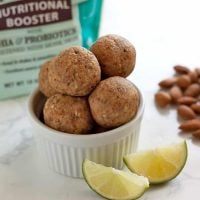 key lime pie protein balls in a ramekin with key lime slices