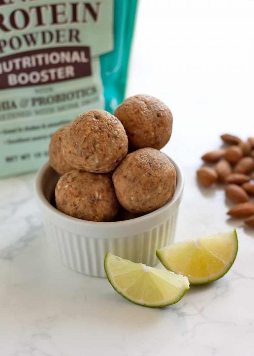 key lime pie protein balls in a ramekin with key lime slices