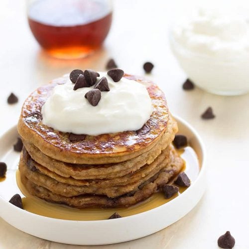Fluffy, healthy, grain-free, dairy-free, refined sugar free, low carb chocolate chip pancakes made with almond flour, raw honey, and dark chocolate chips!