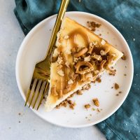Deliciously creamy, small batch salted caramel pretzel cheesecake made with graham crackers, pretzels, and salted caramel.