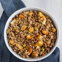 Cubes of toasty French bread mixed with ground beef, ground pork, diced ham, herbs, spices, sliced almonds, chopped olives, and sweet plantains! The BEST stuffing you'll ever try!