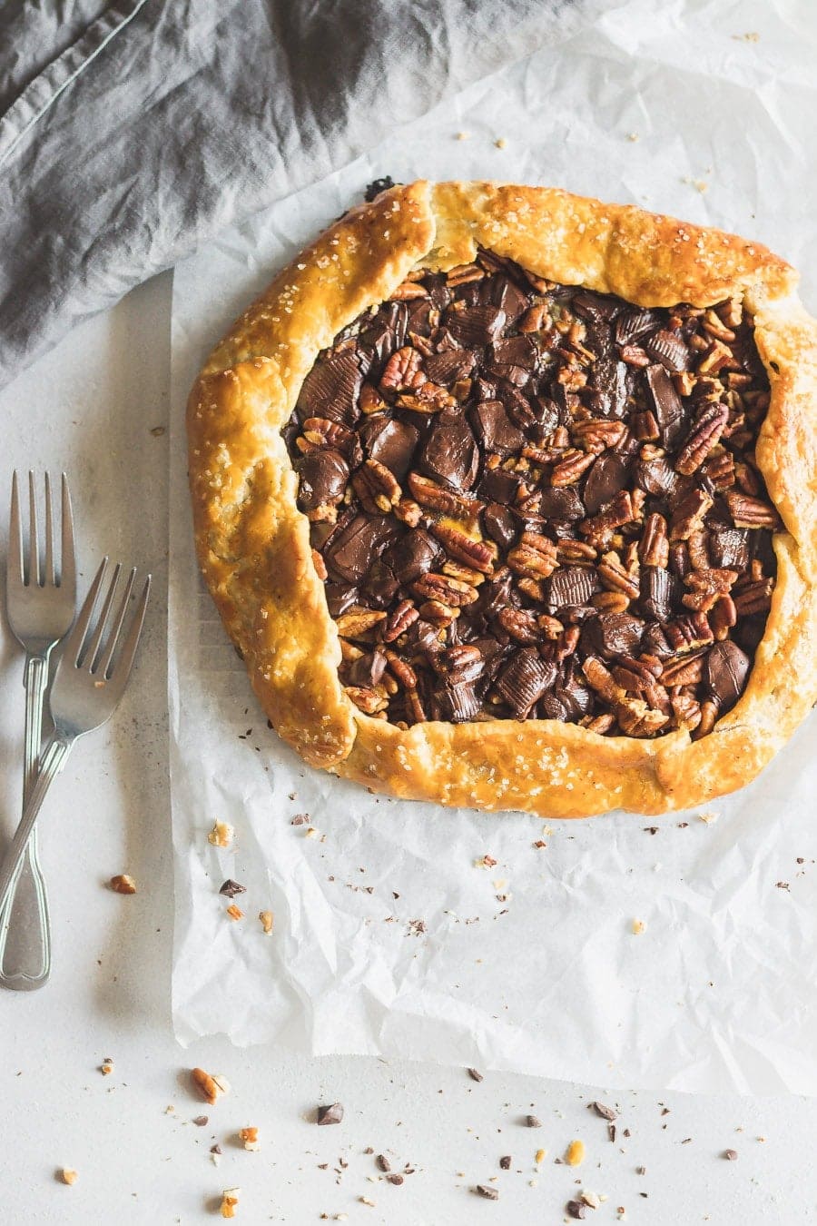 Everything you love about pecan pie but WAY easier. This flaky buttery pecan pie galette has dark chocolate, strong espresso, raw honey, and chopped pecans.