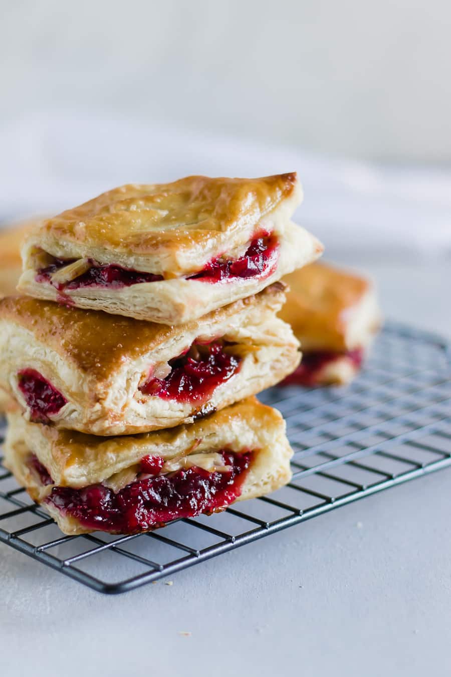Leftover Cranberry + Turkey Turnovers. Repurpose Thanksgiving leftovers by making savory sweet pastelitos (or hand pies) using puff pastry sheets!