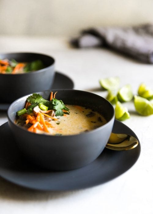 Vegetarian Thai coconut soup with lime slices