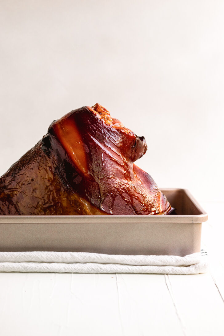 Succulent glazed ham with rich caramelization, perfect for holiday dinners or special occasions.