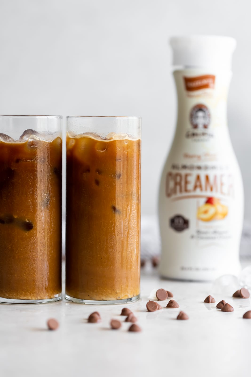 A frothy dairy-free cafe con leche (milk with coffee drink) made iced with sweetened Cuban coffee, creamer, and almond milk.