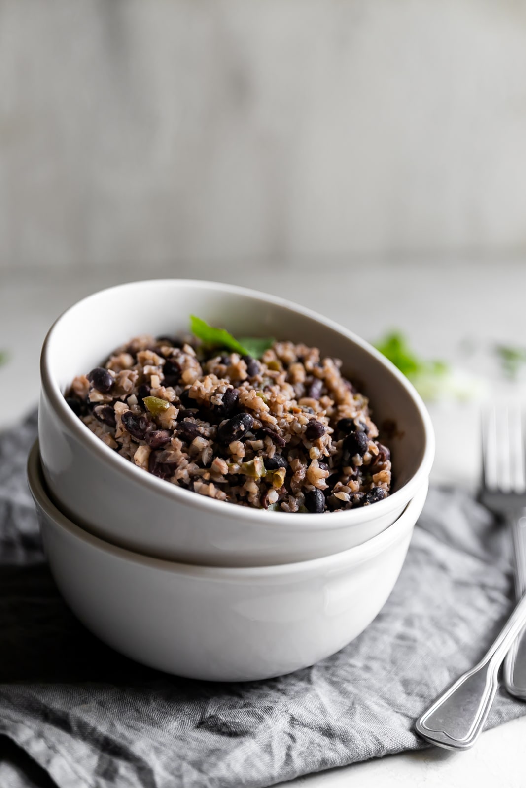 bowl with cauliflower rice and cuban black beans