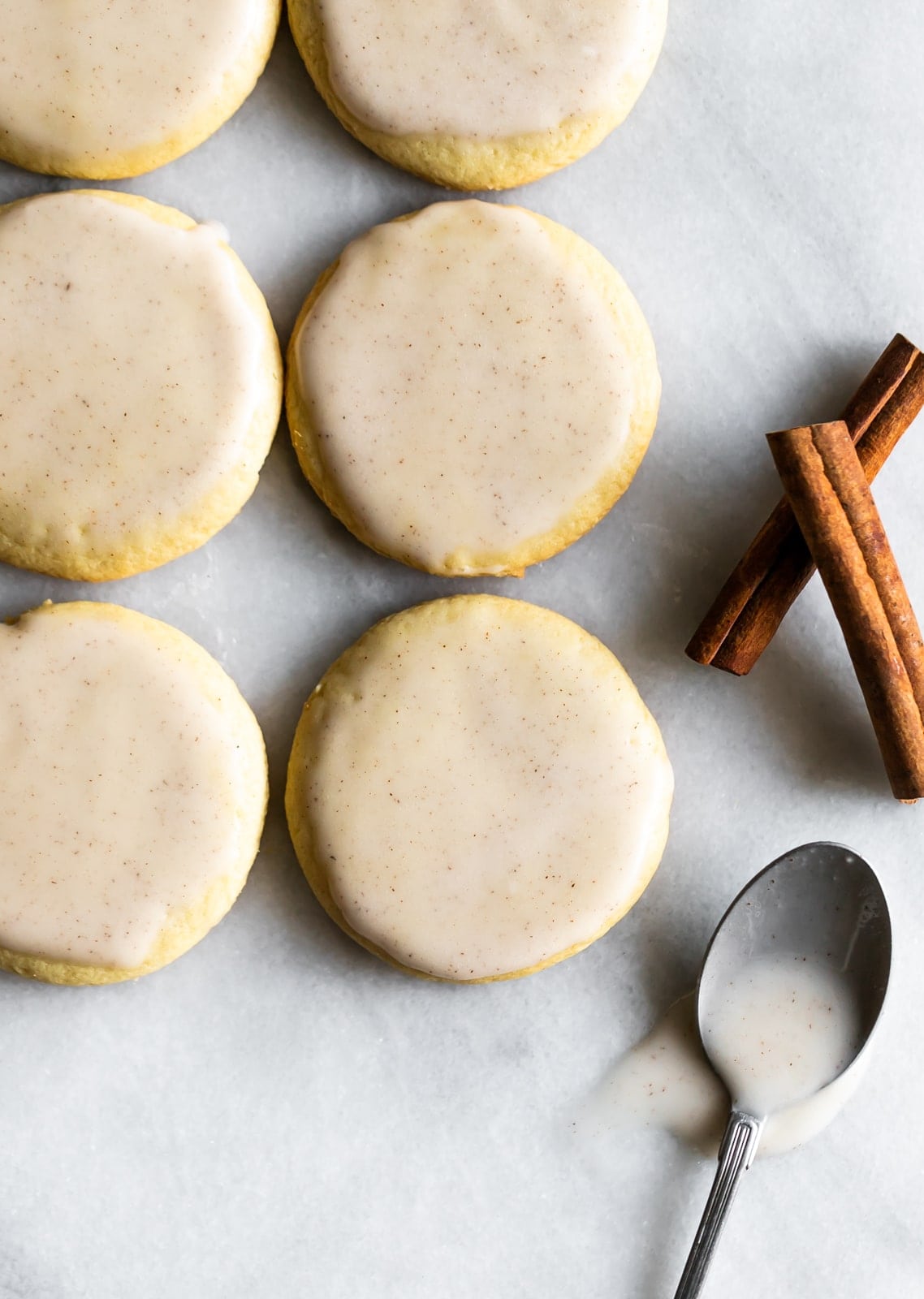 Soft, cut-out sugar cookies topped with a coquito (Puertorican eggnog) icing made with full-fat coconut milk, cinnamon, and rum.