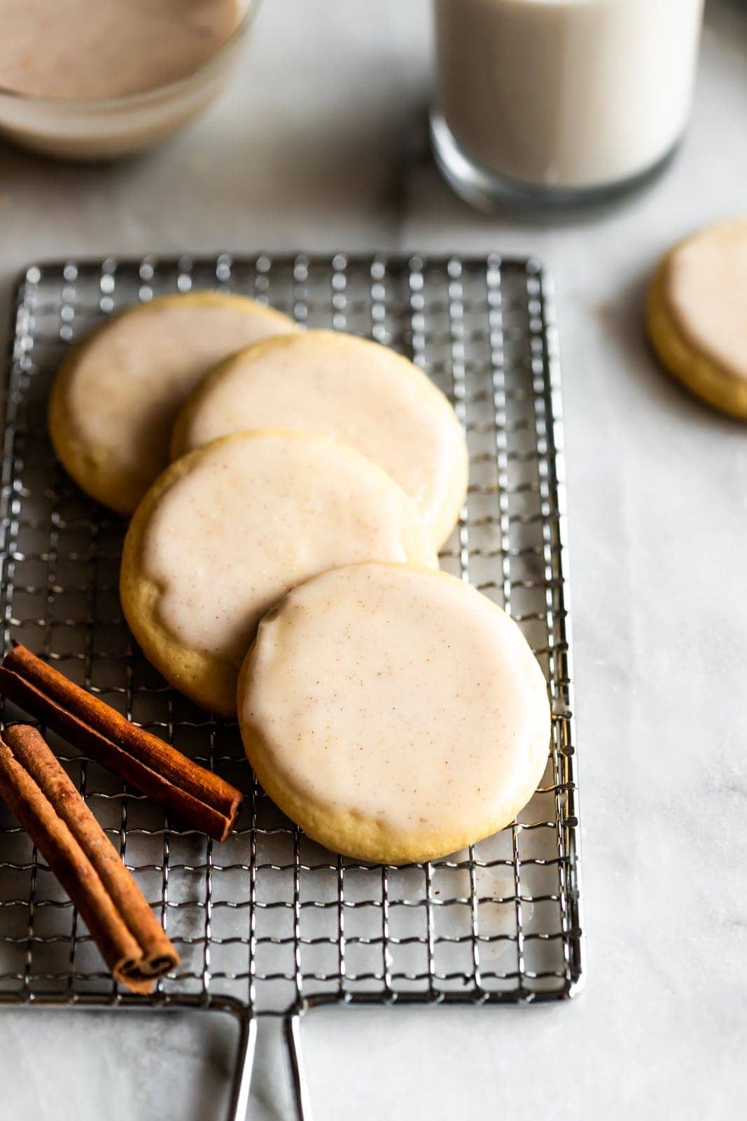 Soft, cut-out sugar cookies topped with a coquito (Puertorican eggnog) icing made with full-fat coconut milk, cinnamon, and rum.