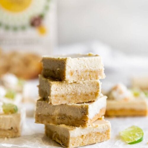 dairy-free coconut key lime pie bars stacked on top of each other