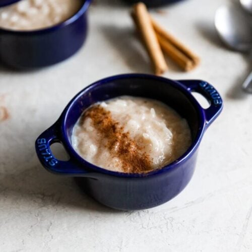 rice pudding or arroz con leche in cocotte with cinnamon on top