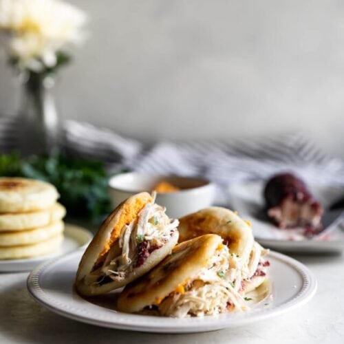Easy-to-make arepas (pan fried corn cakes) made with homemade cranberry goat cheese and your favorite Thanksgiving leftovers!
