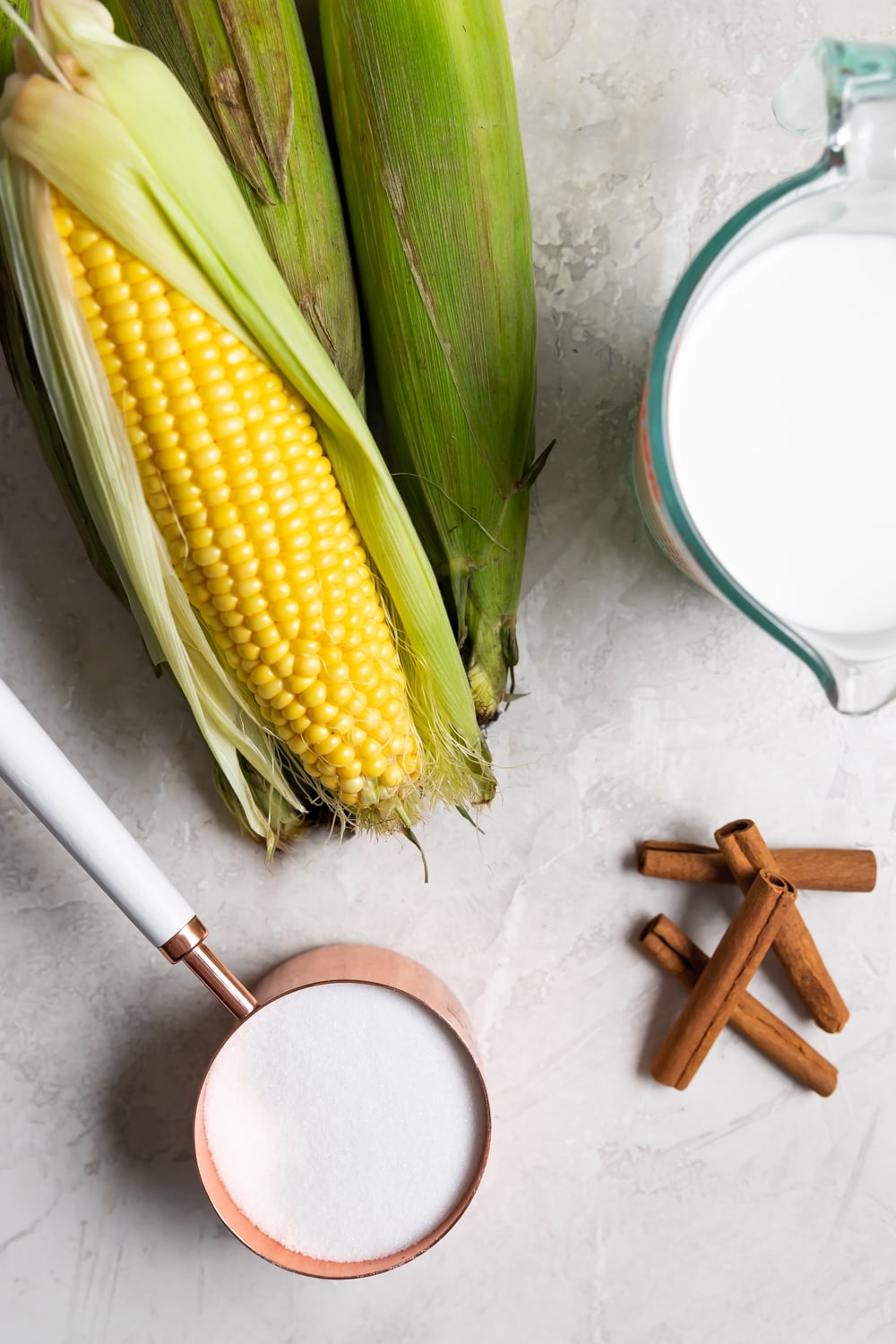 the milk, corn, cinnamon, and sugar are the ingredients for majarete