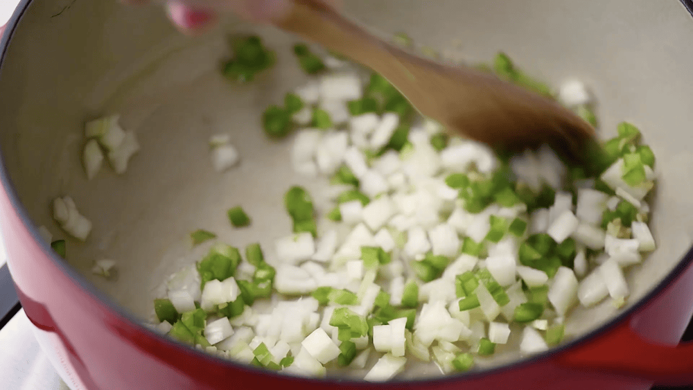 sautéing the Cuban sofrito which is a combination garlic, onions, and peppers