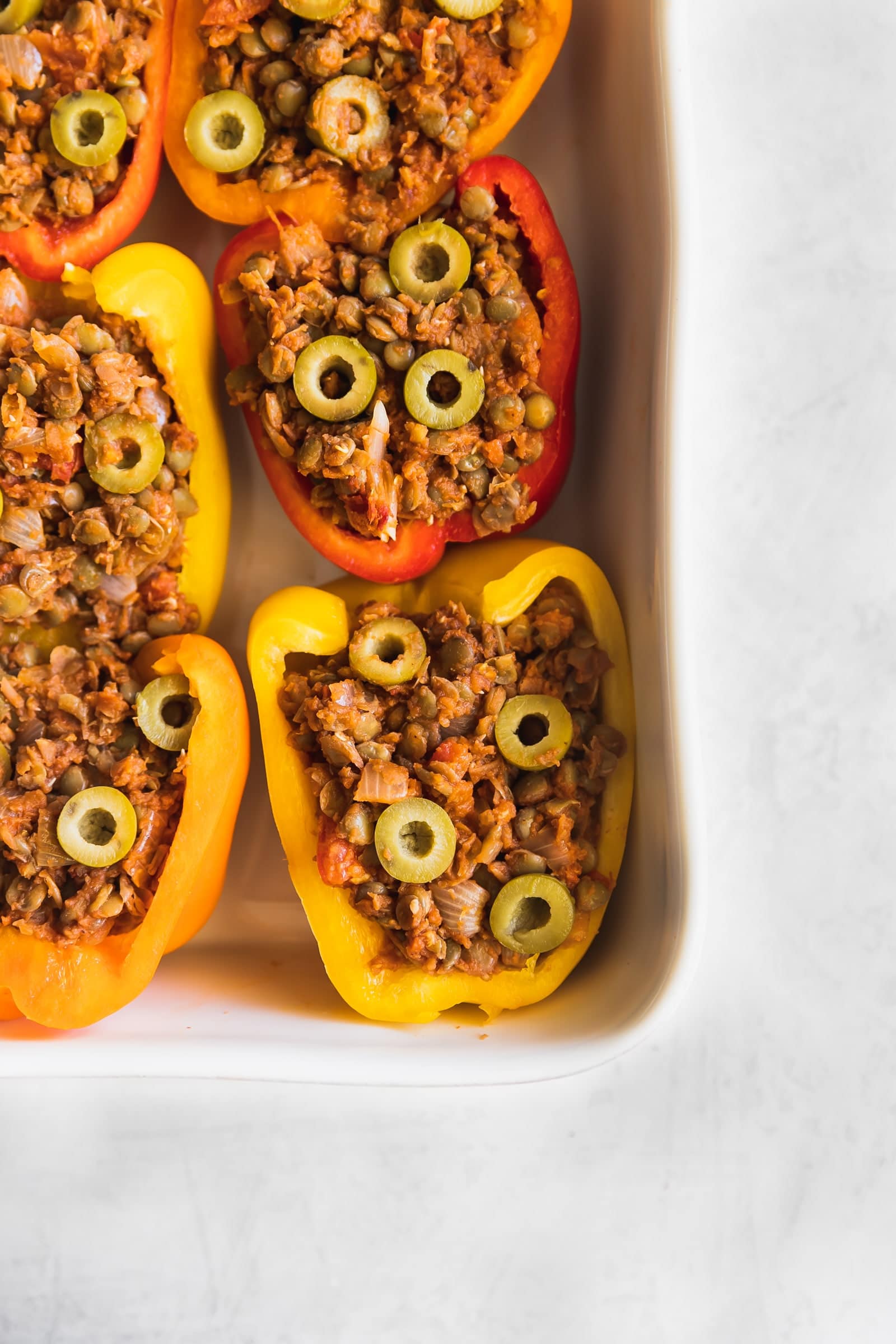 Cuban-Style Vegan Picadillo Stuffed Peppers. This vegan picadillo is a plant-based meal made Cuban-style with lentils, spices, onions, garlic, tomatoes, olives then stuffed in bell peppers. Perfect weeknight dinner!
