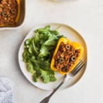 Cuban-Style Vegan Picadillo Stuffed Peppers. This vegan picadillo is a plant-based meal made Cuban-style with lentils, spices, onions, garlic, tomatoes, olives then stuffed in bell peppers. Perfect weeknight dinner!