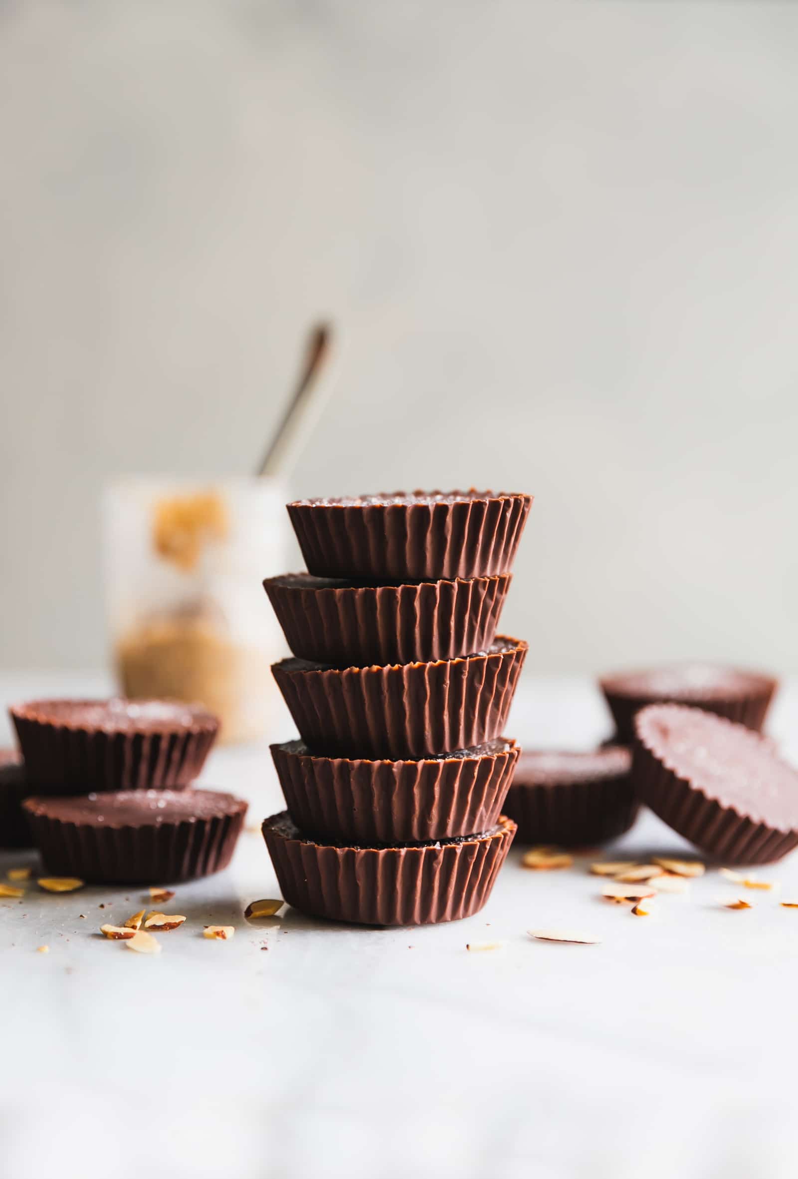 These almond butter cups are made with just 5 ingredients -  dark chocolate, coconut oil, almond butter, chopped almonds, and sea salt. Perfect snack!