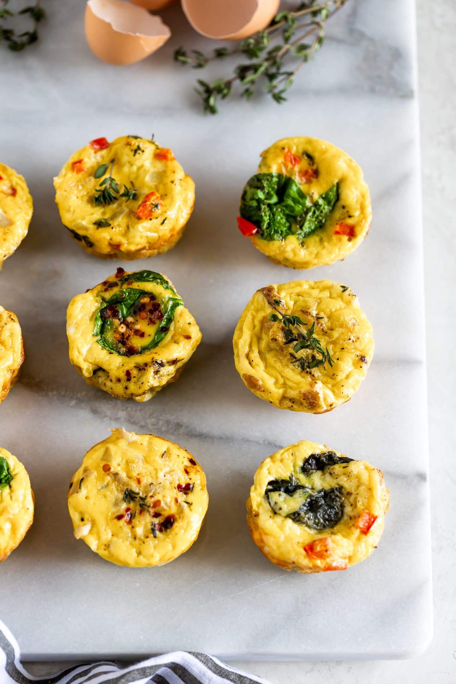 Egg Muffin Cups laying out on sheet pan