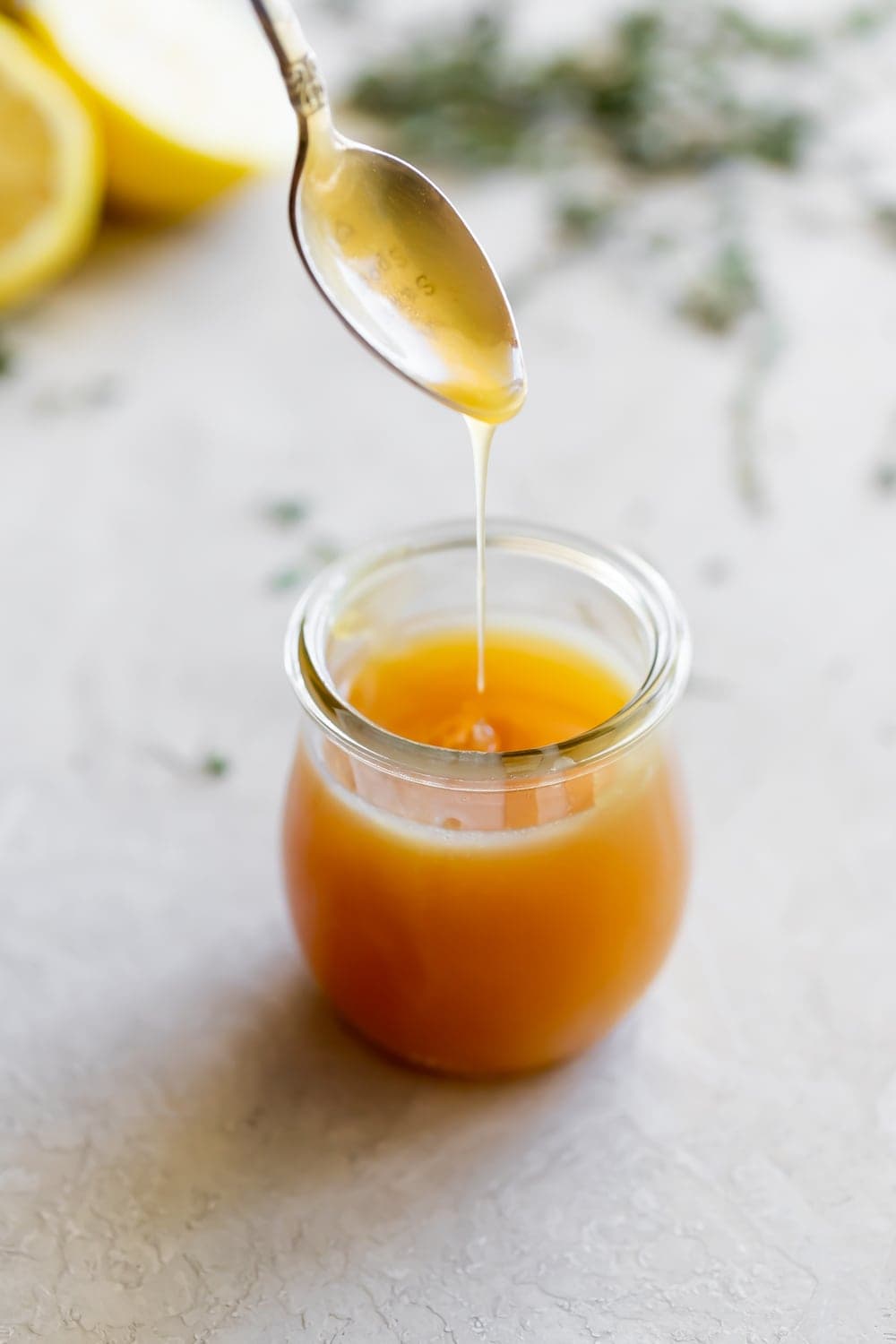 jar with easy homemade honey butter sauce 