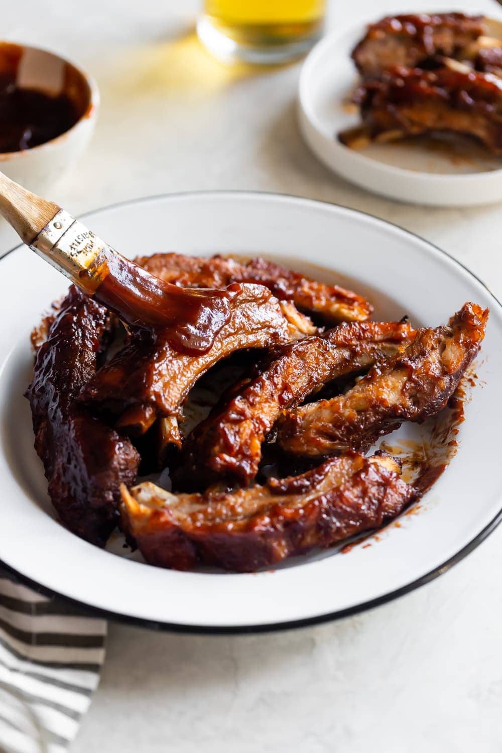 https://asassyspoon.com/wp-content/uploads/oven-baked-bbq-baby-back-ribs-recipe-a-sassy-spoon-5.jpg