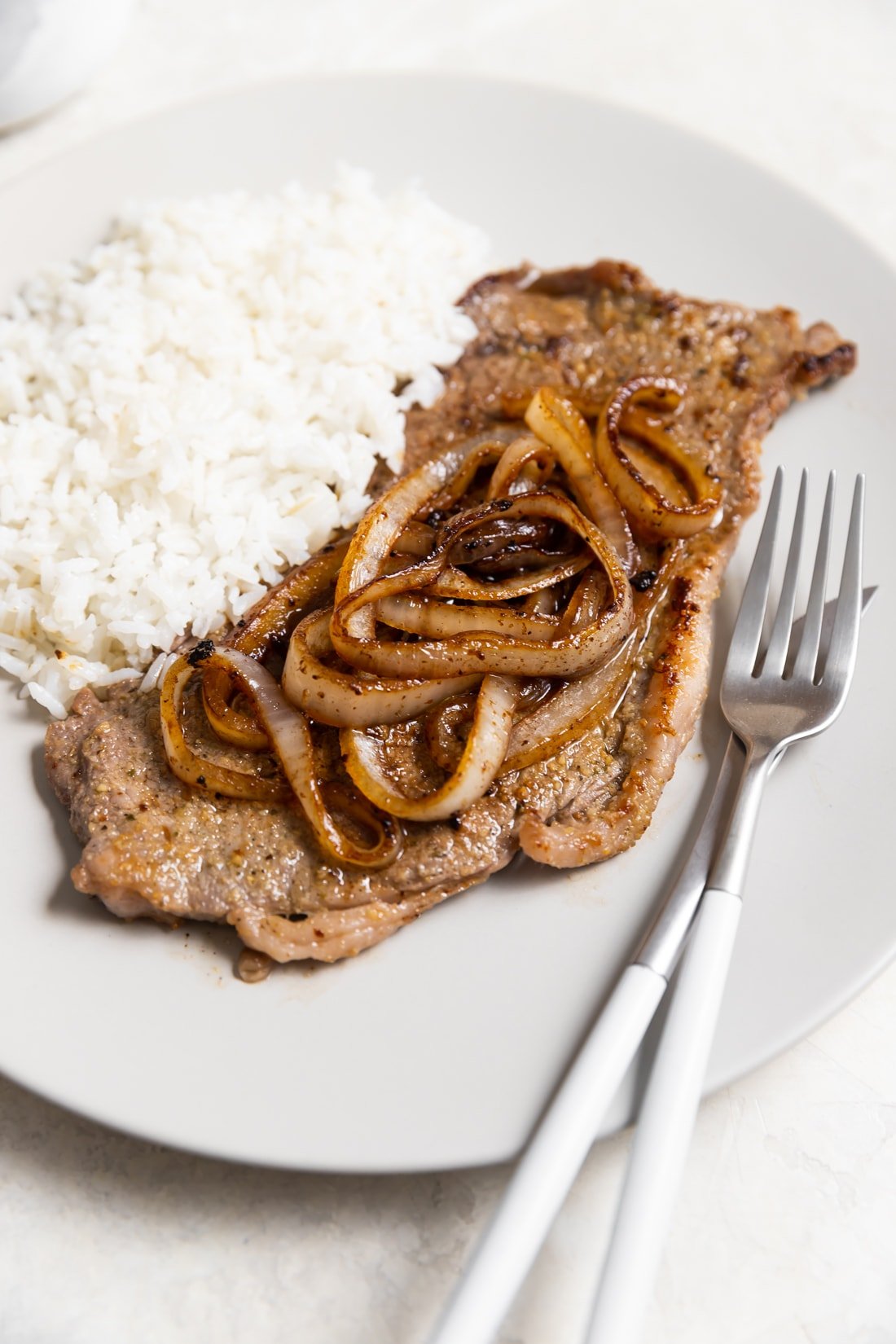 Bistec de Palomilla (Cuban Steak and Onions) - A Sassy Spoon