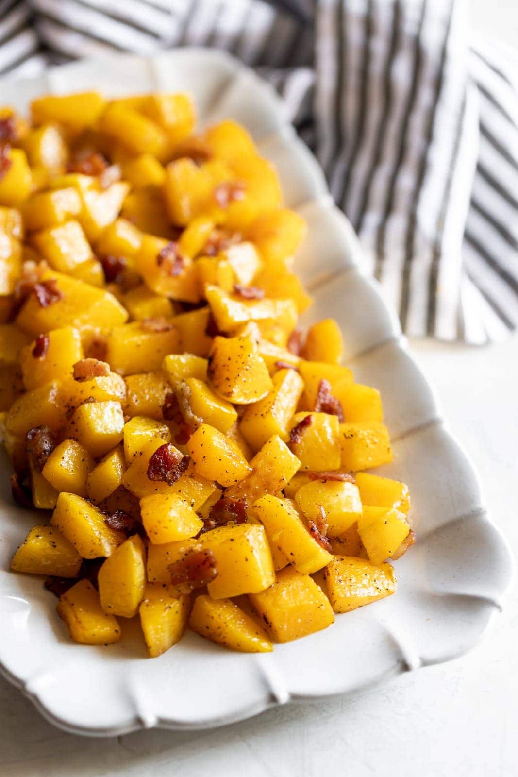 A simple savory roasted butternut squash with crisp pieces of bacon. A healthy, easy to make side dish made with just 3 ingredients!