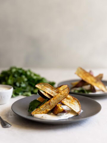 Japanese sweet potato fries, sprinkled with chili powder, salt, and pepper, roasted then served with a charred scallion creme fraiche. Perfect appetizer!