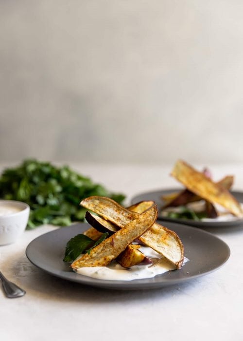 Japanese sweet potato fries, sprinkled with chili powder, salt, and pepper, roasted then served with a charred scallion creme fraiche. Perfect appetizer!